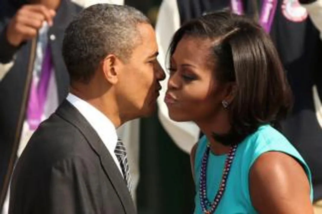 23 Cutest Candid Moments Between Michelle & President Barack Obama 5-Barack-Michelle-Obama-Getty-082316