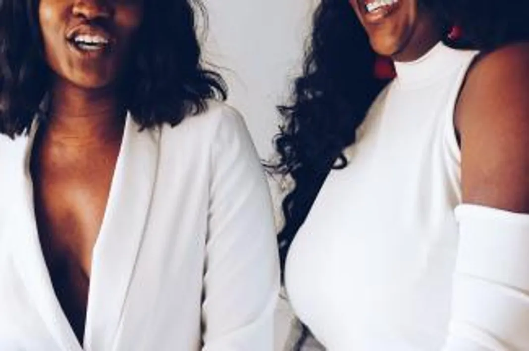 2 black women laughing